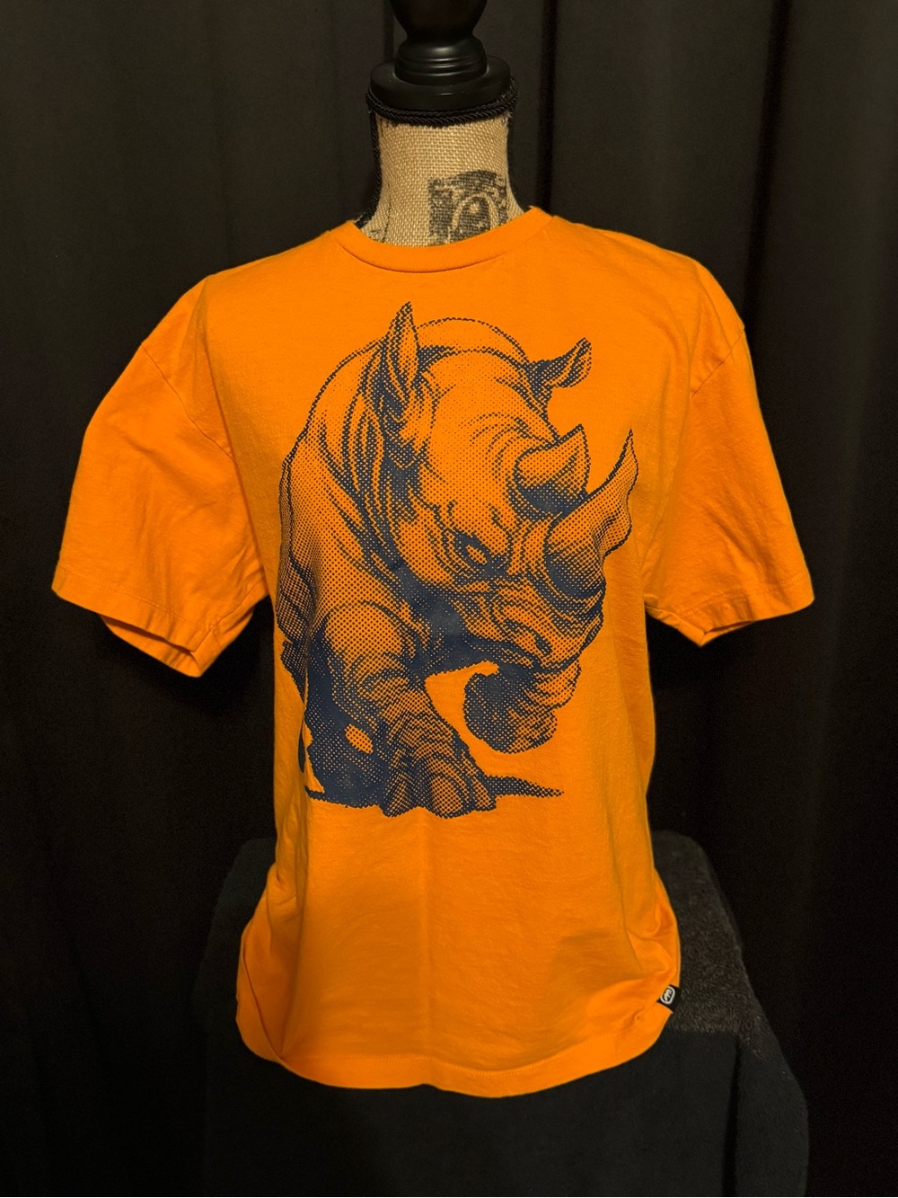 Echo Orange Tee with Charging Navy Rhino Graphic